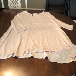 Cream flowy three quarter length top